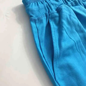 กางเกงขาสั้นเอวยางยืดสีพื้น ทรงลำลอง ใส่สบาย เอวกลาง มีเชือกผูก เหมาะสำหรับออกกำลังกาย มีกระเป๋า - Product Image 4