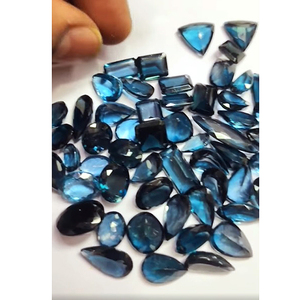 Haute Qualité 55 Pcs 10-14mm Ovale Poire Rectangle Trillion Facette Naturel Londres Bleu Topaze En Vrac 280 Cts Lot pour Iroc Ventes - Product Image 1