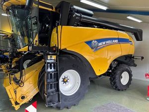 รถเกี่ยวข้าวขนาดเล็ก New Holland CX7090 10 แถว ระบบเกียร์ ขับเคลื่อนด้วยเกียร์ พร้อมจำหน่าย มีสต็อก คุณสมบัติพรีเมียม จัดส่งรวดเร็ว - Product Image 2
