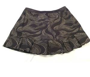 Falda de Tenis Plisada de Cintura Alta para Mujer al por Mayor, Diseño Personalizado en Espiral Negro/Plateado, Transpirable, de Spandex/Poliéster para Golf - Product Image 1