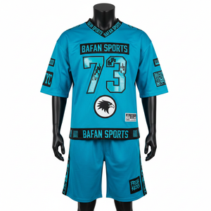 Ensemble short et maillot de football pour homme, respirant, en polyester mesh, bleu turquoise et noir, avec panneau graphique, logo personnalisé par sublimation. - Product Image 1