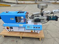 Machine de moulage par injection électrique avec système hydraulique