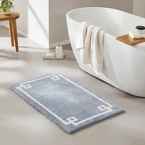 Tapis de bain durable fabriqué en tissu absorbant de qualité supérieure, à texture douce, séchage rapide et support fiable. - Product Image 1