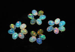 24-Piece 13.60 Carats Ethiopian Opal Cabochons Natural Ovals 5x7mm Loose Gemstones Oval Cut - Product Image 3
