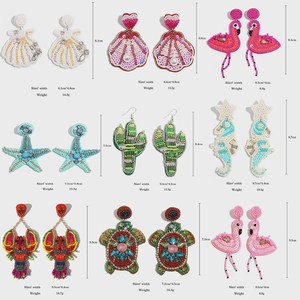 Pendientes de cuentas bohemias con flecos en cascada Andy de diseño turquesa, regalo de joyería único - Product Image 1