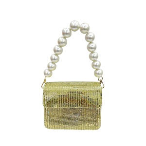 Fashionista's Statement <b>Pearl</b> Strap Clutch <b>Bag</b> for Elegant Evenings & Timeless Style Sensations - Product Image 1