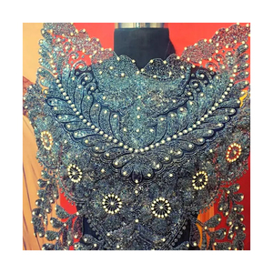 Chemise courte décontractée tendance pour femmes avec un design africain brodé de perles, idéale pour l'été - Product Image 5