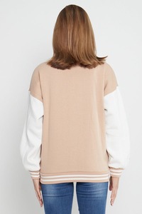 Chaqueta universitaria SALVA IMPEX de marca propia para mujer, brazos de cuero Beige de calidad Premium, parches de chenilla, método de tejido - Product Image 6