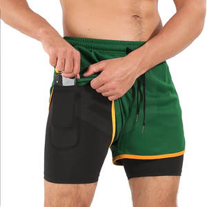 Pantalones cortos atléticos de doble capa de Venta caliente Nuevo estilo Calidad Premium Color sólido Cintura media Transpirable Cierre de cintura elástica - Product Image 1