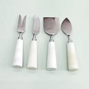 เครื่องตัดและที่กระจายชีสขัดเงาเครื่องเงินสแตนเลสสีขาวหินอ่อนแบบกลม - Product Image 1