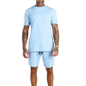 Ensemble deux pièces d'été personnalisé pour homme en coton uni à manches courtes, tissu respirant, idéal pour le quotidien 2026 - Product Image 1