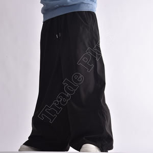 Nuevos pantalones de nieve holgados Unisex de gran tamaño impermeables a prueba de viento y cierre de cremallera pantalones de esquí de pierna ancha personalizados para hombres - Product Image 3
