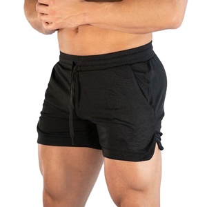 Pantalones cortos de gimnasio para hombre, pantalón de chándal informal antiarrugas de lona sólida, pantalones de chándal para culturismo, pantalones cortos activos con cordón - Product Image 3
