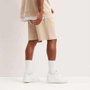 Short vierge ample unisexe en éponge française imprimé uni tricot de coton polaire Short de jogging pour hommes avec logo personnalisé de grande taille - Product Image 4