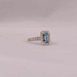 Fashionable Solitaire Blue Emerald Cut Lab Grown Diamond With Tiny Round Cut Diamond Halo Engagement Ring in 18KT <b>Solid</b> Gold - Product Image 5