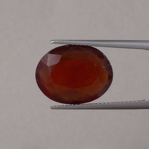 พลอยเฮสโซไนต์สีแดงธรรมชาติขายส่ง น้ำหนัก 9.28 กะรัต ทรงรี ขนาด 17x13 มม. สีอ่อน |   การผลิตเครื่องประดับที่ได้รับการรับรองจาก IGI - Product Image 1