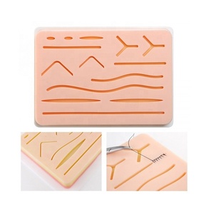 Almohadilla de sutura de silicona para estudiantes de medicina de alta calidad de acero inoxidable con 17 heridas precortadas - Product Image 2