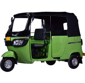 Motocicleta TVS King Deluxe GS+ FI con Puertas, Verde Lima, Rendimiento Superior, Estilo Vintage - Product Image 1