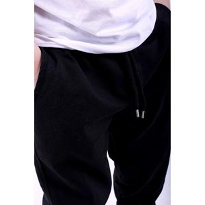 Pantaloni della tuta a doppia tasca neri con faccia sorridente
