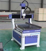 Graveur CNC de bureau 6090, petite machine de travail du bois pour la publicité, équipement de fraisage et de gravure CNC de précision