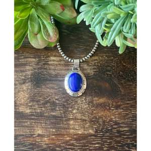 Pendentif artisanal Navajo en lapis-lazuli et argent sterling, motif goutte d'eau ethnique avec sertissage clos et incrustation or rose, breloques pendentifs - Product Image 1