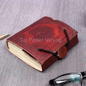 Top hecho a mano cuero marrón bloqueo diario 200 GSM papel A4 tamaño pavo real en relieve tapas duras papel cuero Real cuadernos venta conjunto - Product Image 1