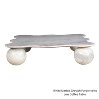 Table basse sculpturale moderne en marbre naturel ORRIS LIVING, plateau artistique, base de luxe, mobilier de salon