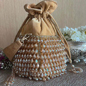 2025 @ Women's Party-wear Wrist POTLI <b>Bags</b> on Velvet Fabric with Beautiful Embellished Crystal Glass Beads, Tassels work - Product Image 1