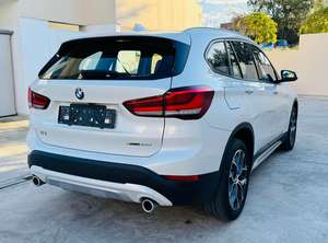 BMW X1 2021, boîte automatique, intérieur foncé, sièges en cuir, taille des pneus R17, conduite à gauche, essence, état d'occasion. - Product Image 5