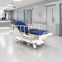 Chariot de transfert médical hydraulique d'urgence avec roulettes à verrouillage centralisé pour le transport de patients hospitaliers