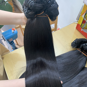 Vente en gros pas cher 100% cheveux bruts vietnamiens non transformés os lâche vague profonde naturel vierge Remy Machine Double trame Extension - Product Image 1