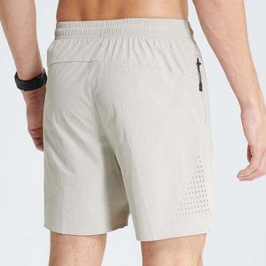 Pantalones cortos de gimnasio de algodón antiencogimiento con logotipo personalizado OEM, pantalones cortos de playa ajustados con bolsillos laterales grises para hombre - Product Image 3