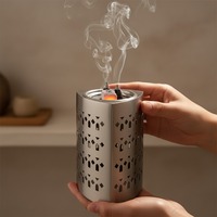 Brûleur d'encens en acier inoxydable avec des motifs géométriques élégants pour une diffusion d'arômes douce, design durable pour un usage quotidien