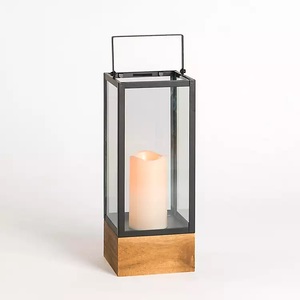 Linterna de vela de hierro estilo cabaña con recortes florales, ideal para decoración para sala de estar, entradas y reuniones familiares - Product Image 2