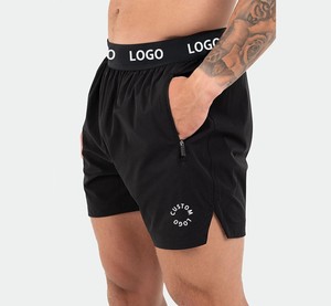 Pantalones cortos de gimnasio para correr de 5 pulgadas con logotipo personalizado para hombre, dobladillo dividido, lona de algodón 100% Sostenible, transpirables, ligeros, informales de secado rápido - Product Image 1