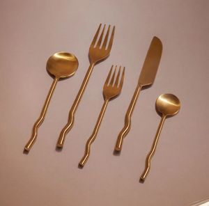 Designer stylish metal cutlery <b>set</b> with unique patterns suitable for modern homes kitchen dining and decor - Product Image 1
