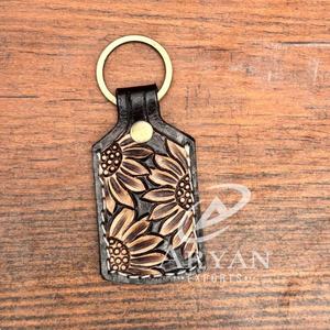 Nouveau porte-clés en cuir de tournesol en cuir usiné à la main occidental sculpté porte-clés en cuir véritable à la main en cuir de vachette porte-clés de voiture de luxe - Product Image 1