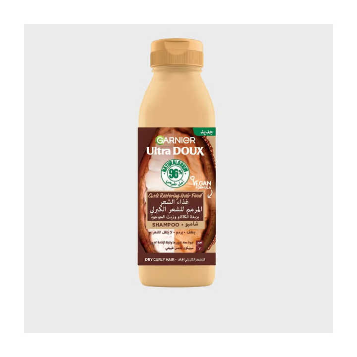 Cleanse and define your curls with Garnier Ultimate Blends Hair Food 350ml Shampoo Cocoa Butter formula
