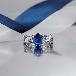Bague de fiançailles Jeulia en saphir bleu taille ovale en argent sterling avec motif feuilles torsadées - Product Image 4