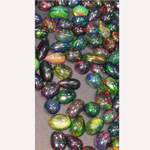 269ชิ้นของโอปอลสีดำจากเอธิโอเปียธรรมชาติที่มีไฟ9มม. ถึง15มม. ลูกแพร์รูปไข่ Cabochon 497 CTS iroc ขายอัญมณี CAB เรา $796สำหรับทุกคน - Product Image 3