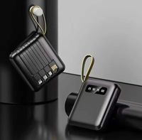 Station d'alimentation portable 10000mAh 2-en-1 avec câbles intégrés, écran LCD numérique, sortie 12W, pour téléphones, à prix de gros
