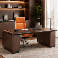 Chaise de bureau de direction en cuir PU orange à dossier haut avec accoudoirs intégrés et base à roulettes chromée – Vente en gros usine