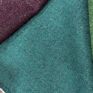 Tela de tweed de lana y poliéster Royal Shiny en color verde botella, última colección en tela brillante de 300 gsm - Product Image 1