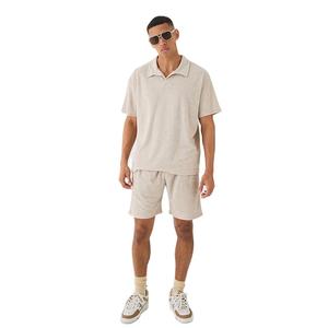 Vêtements décontractés à la mode pour hommes Twinset pour l'été Top vente Nouveau ensemble de chemises et de shorts à col Vente en gros de tissu éponge - Product Image 1