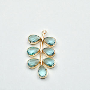 Plata de Ley 925 con Topacio Azul de 4x6 mm, Gema en Forma de Hoja, para Fabricación de Joyas y Dijes - Product Image 1