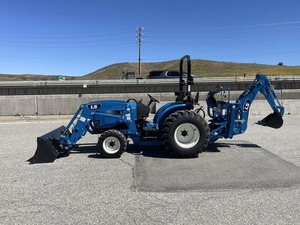 Chargeuse-pelleteuse compacte bleue LS 4x4, mini-tracteur avec godet avant et pelle arrière pour la construction agricole - Product Image 4