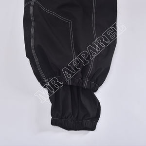 Pantalon de neige noir imperméable au design nouveau avec surpiqûres contrastées blanches, ceinture réglable, braguette avant, poche cargo et coupe ample double - Product Image 6