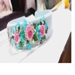 custom made embroidered hair bows with floral patterns ideal for resale by hair accessory can be with custom names embroidered