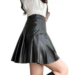 Vente en gros de jupe noire en cuir PU personnalisée mini-jupe décontractée pour femmes A ligne pour les déplacements quotidiens des fesses pour femmes