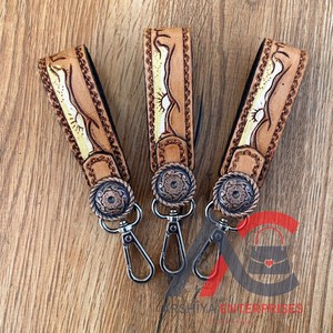 Nuevo Mini Clip de llave de cuero genuino mecanizado a mano de alta calidad, llavero de pulsera multifuncional de piel de vaca occidental, accesorios para mujer - Product Image 1